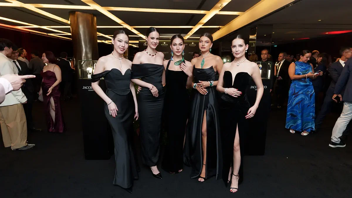 Gala dinner evening dress: five floor-length black gowns, with suits and a long blue printed dress behind them