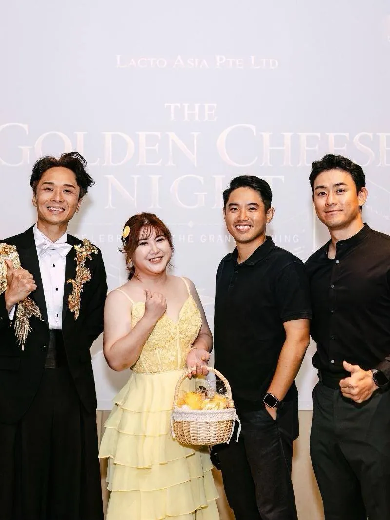 Hosts at the backdrop of The Golden Cheese Night, the Lacto Asia grand opening